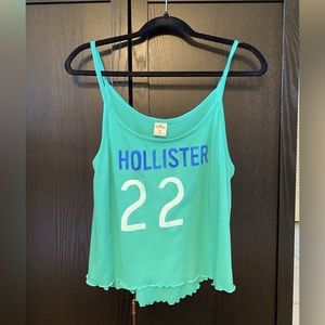 Hollister 22 size medium top in turquoise blue used.